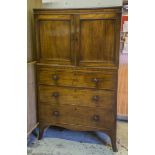 LINEN PRESS, Regency figured mahogany in two sections with two panelled doors and three drawers,