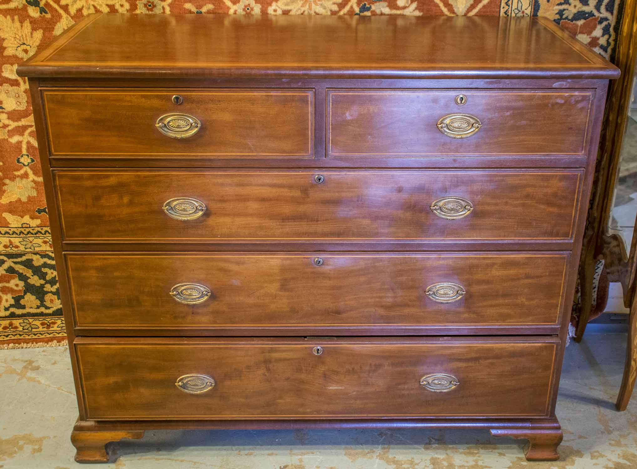 CHEST, George III mahogany, satinwood banded and line inlaid of two short and three long drawers,