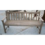 GARDEN BENCH, weathered teak of slatted construction, stamped 'Wrench, England', 157cm W.