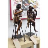 BRONZE FIGURE, Art Deco style ladies on stools sharing a toast, 60cm H.