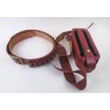 ASPREY CARTRIDGE HOLDER, red leather with shoulder strap and a cartridge belt.