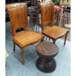 SIDE CHAIRS, a pair, Indonesian hardwood 56cm W plus a small wooden table, 39cm diam x 40cm H.