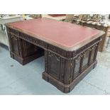 'RESOLUTE' DESK, reproduction mahogany, carved mouldings throughout leather lined top,