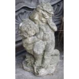 GARDEN STATUARY, composite stone modelled as two cherubs, 59cm H.