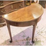 DEMI LUNE TABLE, George III, mahogany, with a rising lid and tapering support on pad feet,