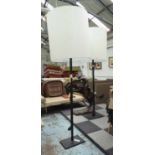 FLOOR LAMPS, a pair, with square stems, on base with large shade, 209cm H.