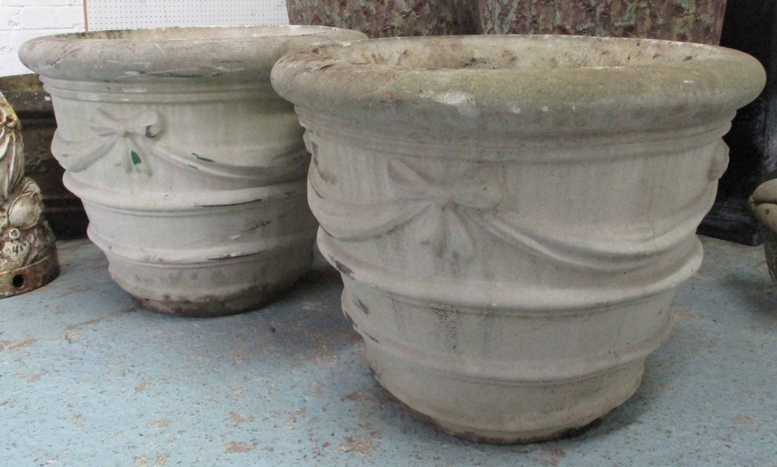 CAMPANA URNS, a pair, in reconstituted stone by A D Delstone, 75cm diam x 59cm H.