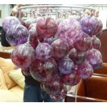CEILING LIGHT, consisting of numerous violet balls, purchased from Roast Designs,
