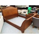 HARRODS SLEIGH BED, by Frank Hudson, 6'0', frame only, in mahogany, with tanned leather headboard.