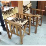 SAFARI CHAIRS, a set of four, folding with cowskin backs and seats, 61cm.