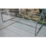 LOW TABLE, rectangular glass, on stepped chromium frame, 60cm D x 120cm W x 35cm H.