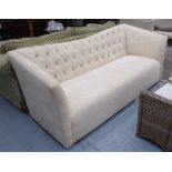 SOFA, two seater, in a neutral fabric on block supports, 204cm L.