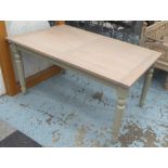 DINING TABLE, extending with two leaves, on painted base with detachable legs,