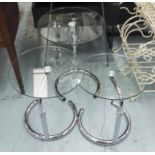 SIDE TABLES, a set of three, with circular glass top on chromed metal supports, 64cm H.