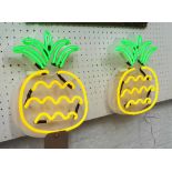 NEON LIGHTS, a pair, pineapple design, 29cm H.