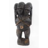 WEST AFRICA TRIPLE-HEADED FETISH FIGURE, carved wood, 61cm H.