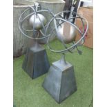 ASTRAL GLOBES, a pair, in metal, on square bases, 94cm H.