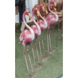 FLAMINGOES, a set of four, in painted metal finish, 100cm H.