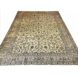 FINE SIGNED KASHAN CARPET, 400cm x 297cm, all over palmette and scrolling vine design,