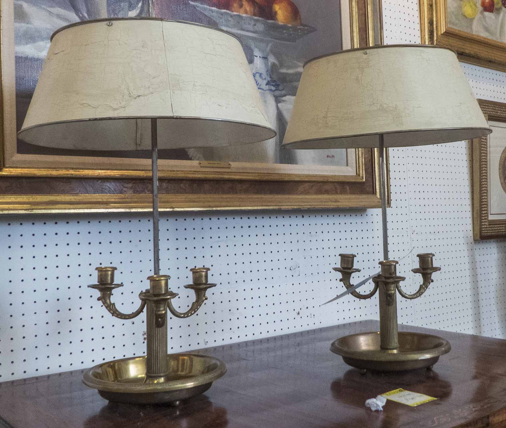 BOUILOTTE LAMPS, a pair, 1930's French brass, with cream painted tole shades, 73cm H x 36cm W.