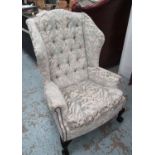 WINGBACK ARMCHAIR, in patterned fabric with button back and claw and ball feet, 85cm W x 122cm H.