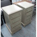 BEDSIDE DRAWERS, a pair, with four drawers and knob handles,