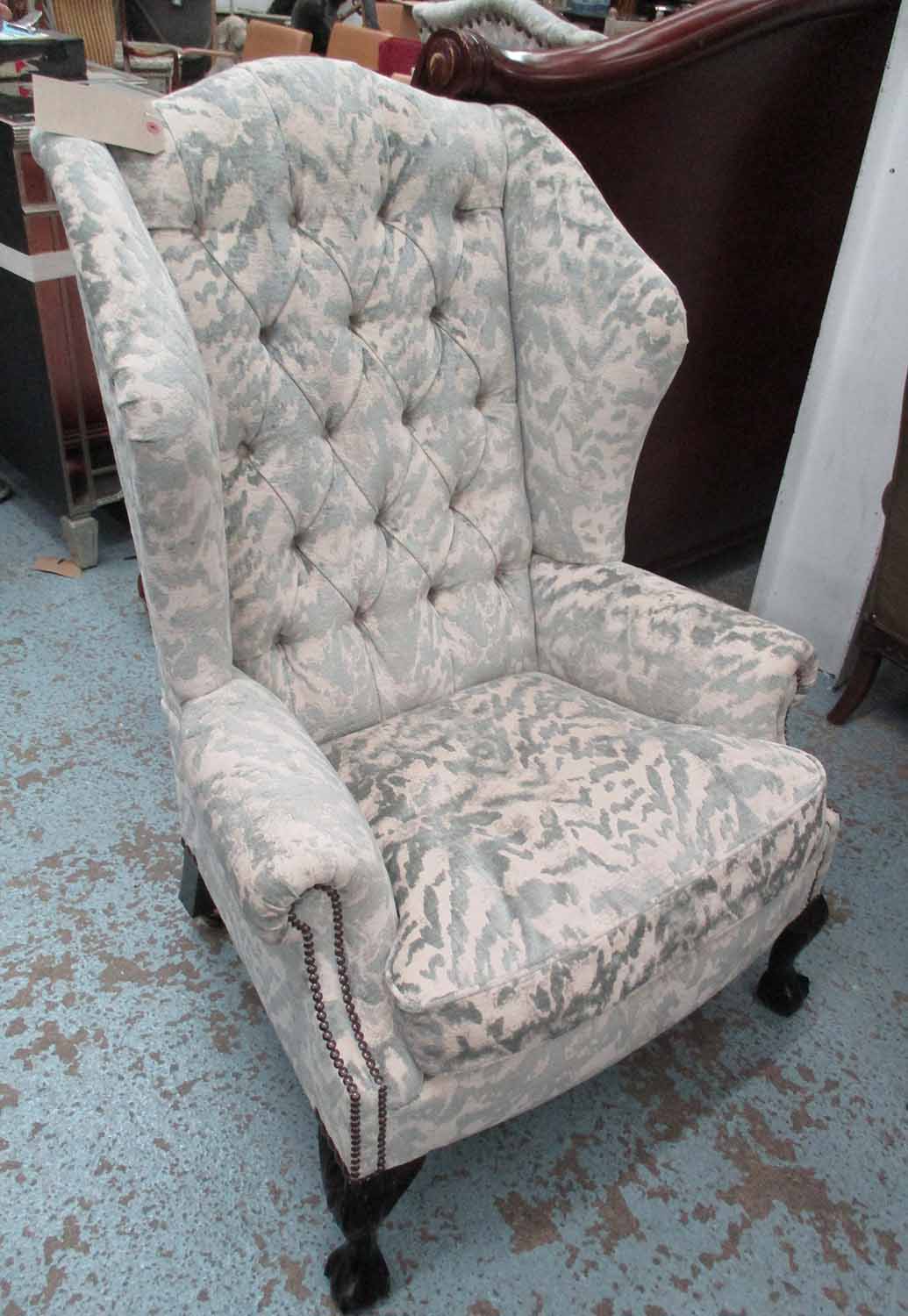 WINGBACK ARMCHAIR, in patterned fabric with button back and claw and ball feet, 85cm W x 122cm H.