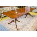 DINING TABLE, Regency design, figured mahogany and rosewood crossbanded,