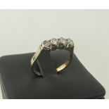 14K YELLOW GOLD RING SET FOUR DIAMONDS, size 'L'.