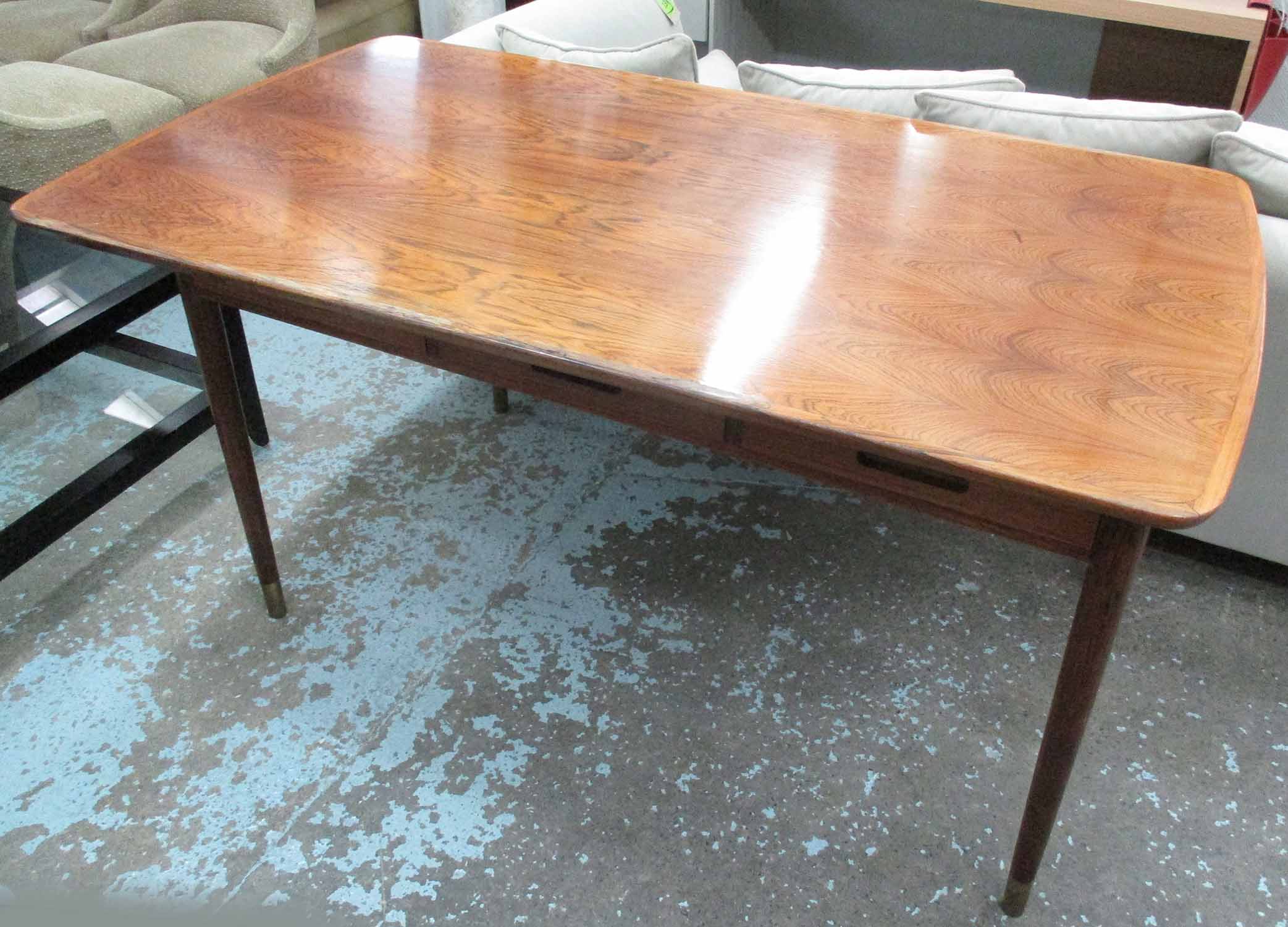 DANISH DESIGN WRITING TABLE, 1960s, rosewood with three drawers below on rounded supports,