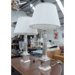 RALPH LAUREN SIDE LAMPS, a pair, polished metal in the form of classical columns,