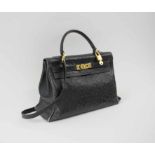 HERMÈS KELLY OSTRICH 32 BAG, black leather with gold hardware, padlock with key,