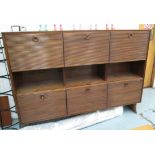 SIDE CABINET, 1960's with six ribbed doors, three above and three below, on end supports,