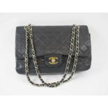 CHANEL VINTAGE DOUBLE FLAP BAG, black leather with interlocked CC lock,