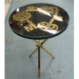 FORNASETTI 'KEYS' OCCASIONAL TABLE, lacquered top on brass base.