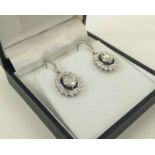 PAIR OF FINE QUALITY 18K WHITE GOLD OVAL DIAMOND AND SAPPHIRE DROP EARRINGS, calibre cut sapphire 1.