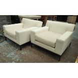 CHRISTIAN LIAIGRE ARMCHAIRS, a pair, in cream leather, each 89cm W x 87cm D x 72cm H.