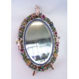 GERMAN PORCELAIN EASEL MIRROR, with an oval plate,