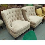 ANDREW MARTIN ARMCHAIRS, a pair, in buttoned cream velvet on turned supports, 87cm W.