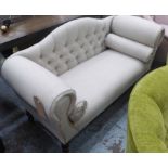 SOFA, two seater, in herringbone fabric on turned castor supports, 140cm L.