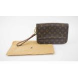 LOUIS VUITTON CLUTCH/POCHETTE, iconic coated canvas pattern with leather trims and wrap handle,