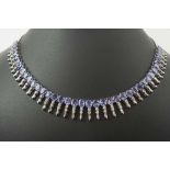 14K WHITE GOLD TANZANITE AND DIAMOND NECKLACE, comprising 39 drops, approx 10cts.