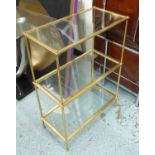 ETAGERES, a pair, with glass shelves on gilded metal frame, 61cm x 31cm x 86cm H.