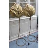 FLOOR LAMPS, a pair, continental, gilt metal of loaf form, 160cm H.