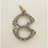 GOLD AND DIAMOND SET 'E' PENDANT, 2cm H.