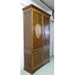 CABINET, burr walnut and satinwood of large proportions with two panelled doors above,