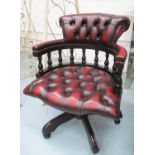 CAPTAINS SWIVEL DESK CHAIR, with buttoned red leather upholstery and a spindle turned back,