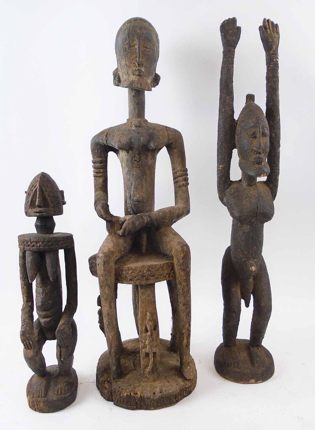 THREE VARIOUS DOGON FIGURES, Mali, carved wood, tallest 61cm H.