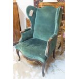 BERGERE A OREILLES, early 20th century French beechwood with green velvet upholstery.