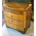 BOWFRONT COMMODE, early 19th century, Swedish elm, mahogany and marquetry, of four drawers,